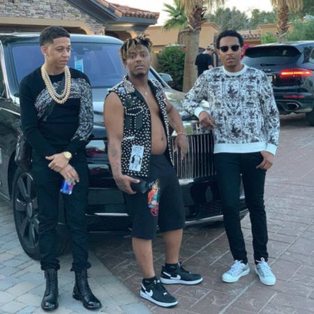 Juice wrld with his 2 friends standing infront of his black Rolls- Royce Cullinan 